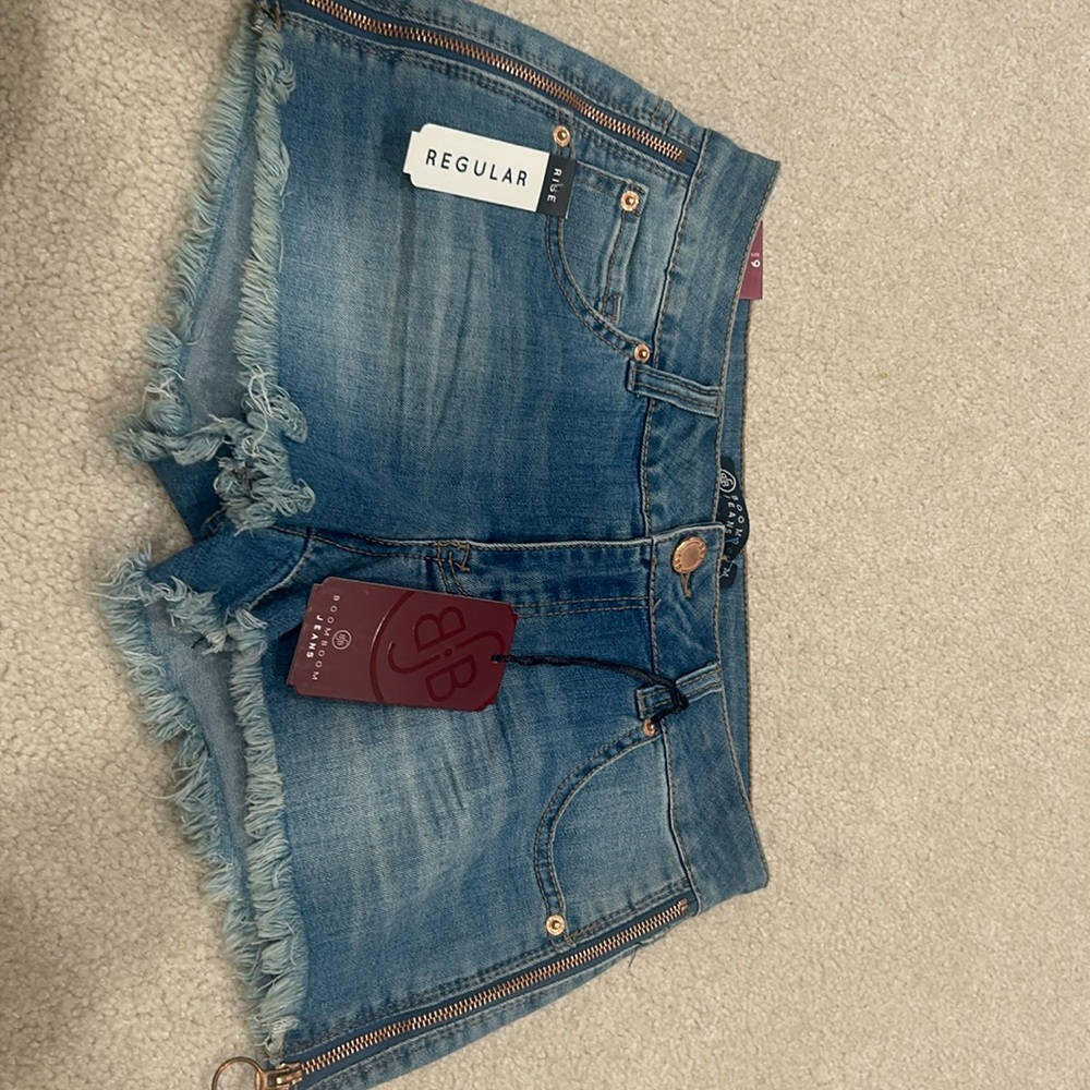 Blue jeans with copper zip trim